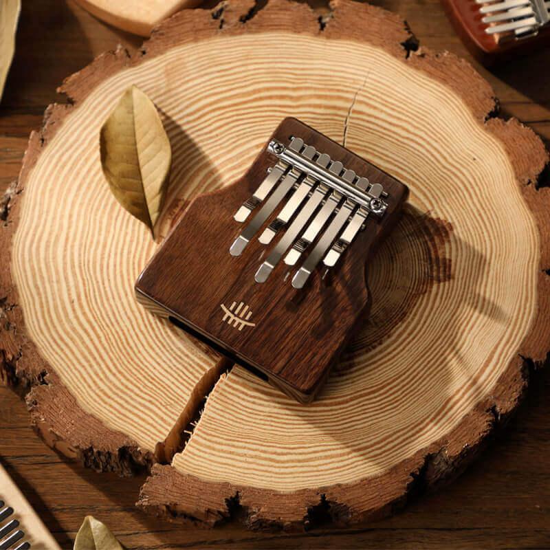 HLURU Mini 7 Key Chord Hollow Thumb Piano Kalimba, American Black Walnut Box Resonace Portable Finger Piano C Tone With a Hole at The Bottom - HLURU.SHOP